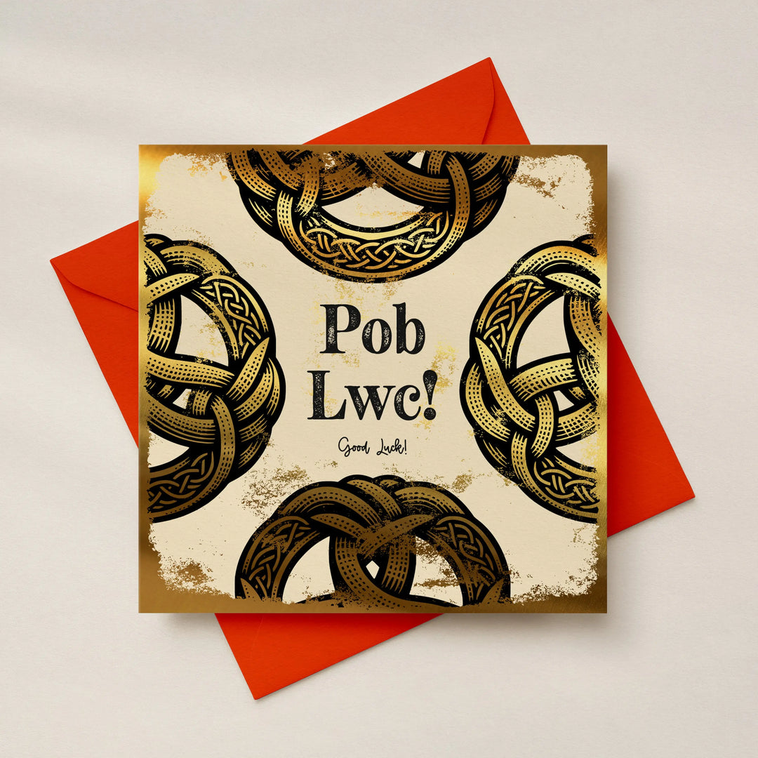 Greeting card with Celtic knot design and 'Pob Lwc!' text on a red envelope.