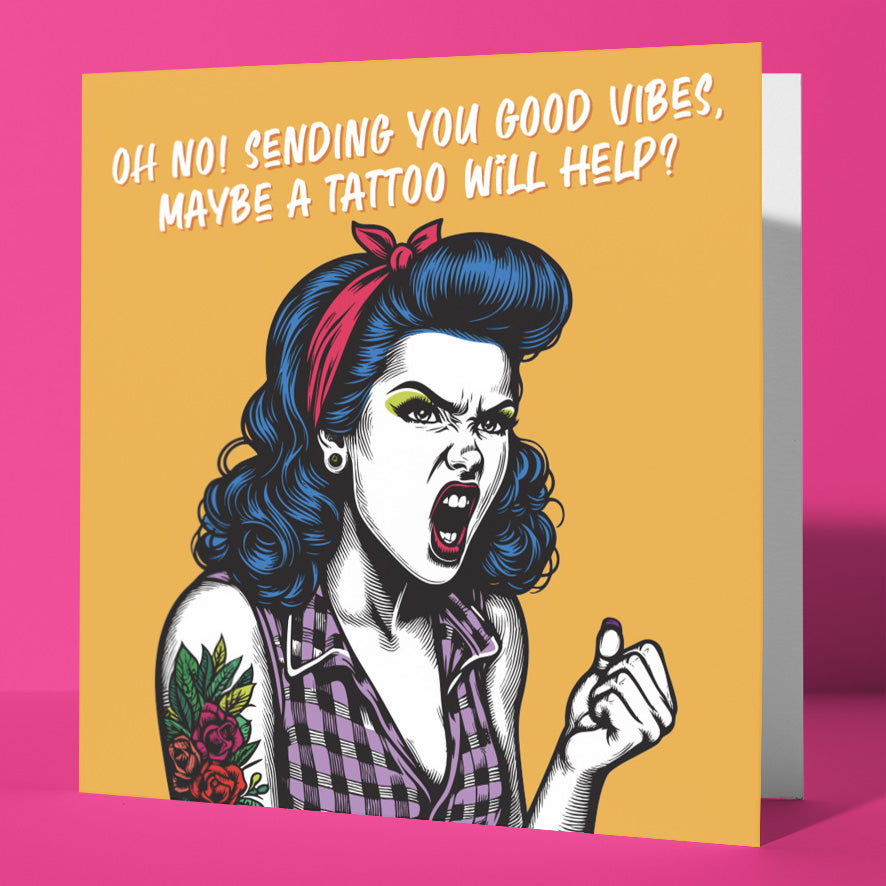 Send a smile with the "Oh No! Sending You Good Vibes, Maybe A Tattoo Will Help?" vintage babes card—a funny, motivational friendship greeting featuring an angry blue-haired woman and a playful passive aggressive message.