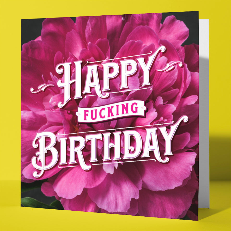 The Happy Fucking Birthday Pink Calla Lilies Card features a bold white "Happy Fucking Birthday" message over a large pink calla lily on a vibrant yellow background.