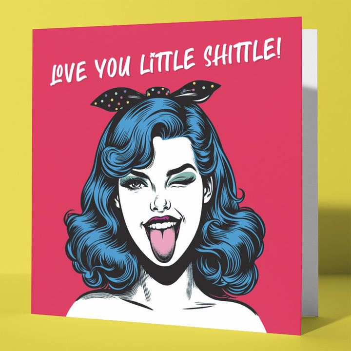The "Love You Little Shittle, Cheeky Romance Relationship Card Vintage Babes" features a cartoon woman with blue hair winking and a vibrant pink background—perfect for playful, fun-loving couples.