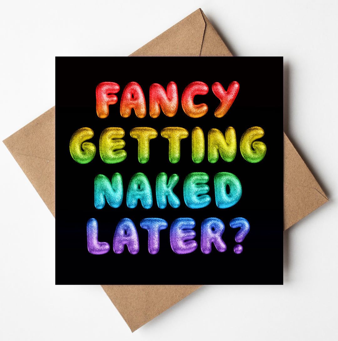 The "Fancy Getting Naked Later? Rainbow Font Card" features a cheeky phrase in vibrant, rainbow font on a black background and comes with a brown envelope.