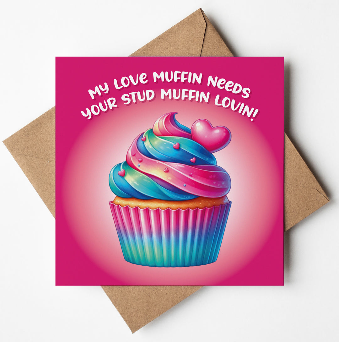 The "My Love Muffin Card" is a candy-colored Valentine's Day card with a cupcake featuring rainbow frosting and pink hearts. The text reads, "My love muffin needs your stud muffin lovin!" It comes with a brown envelope, making it a humorous and sweet way to celebrate love.